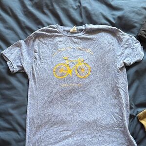 Blue T-Shirt with Yellow Bicycle Graphic
